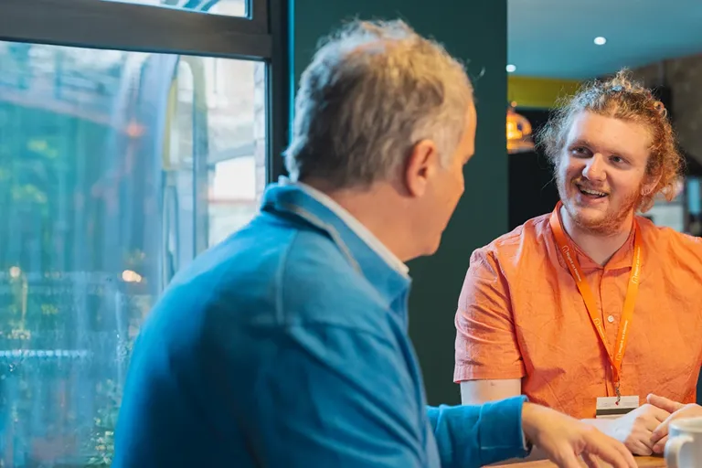 Carer and Client enjoying a cup of tea and a chat